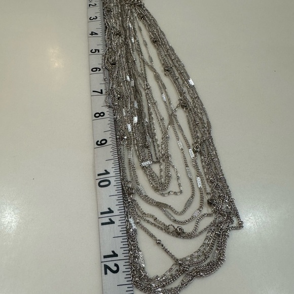 CHLOE & ISABEL 16 Strand Silver Tone Layered Necklace with Rhinestone Accents - Picture 9 of 10